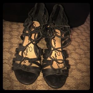 Black strappy wedges.